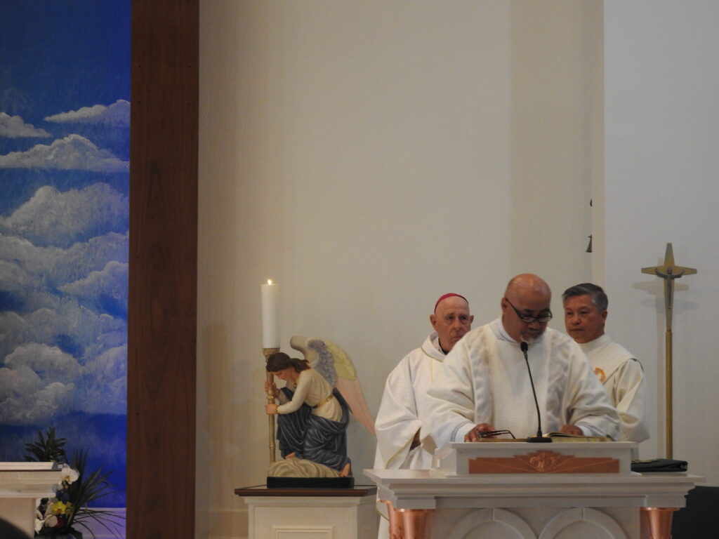 Dcn. Loch reads homily