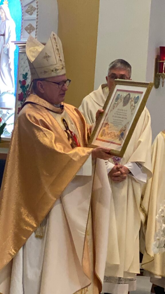 Bp. Barber reads the papal blessing
